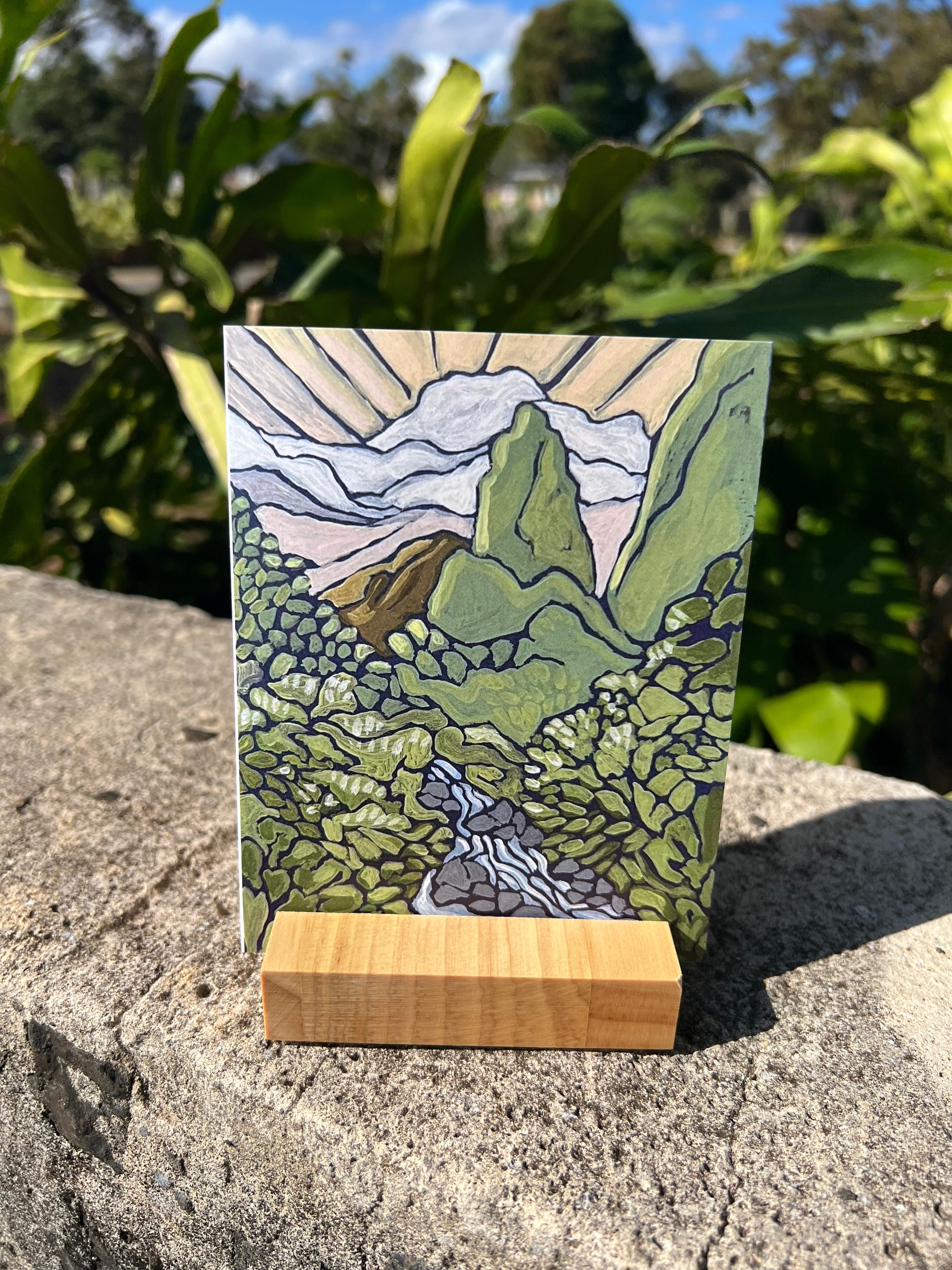 Small landscape painting of a mountain river scene. 